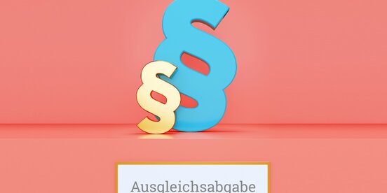 Blaues und gelbes Paragrafenzeichen auf rotem Hintergrund Blaues und gelbes Paragrafenzeichen auf rotem Hintergrund